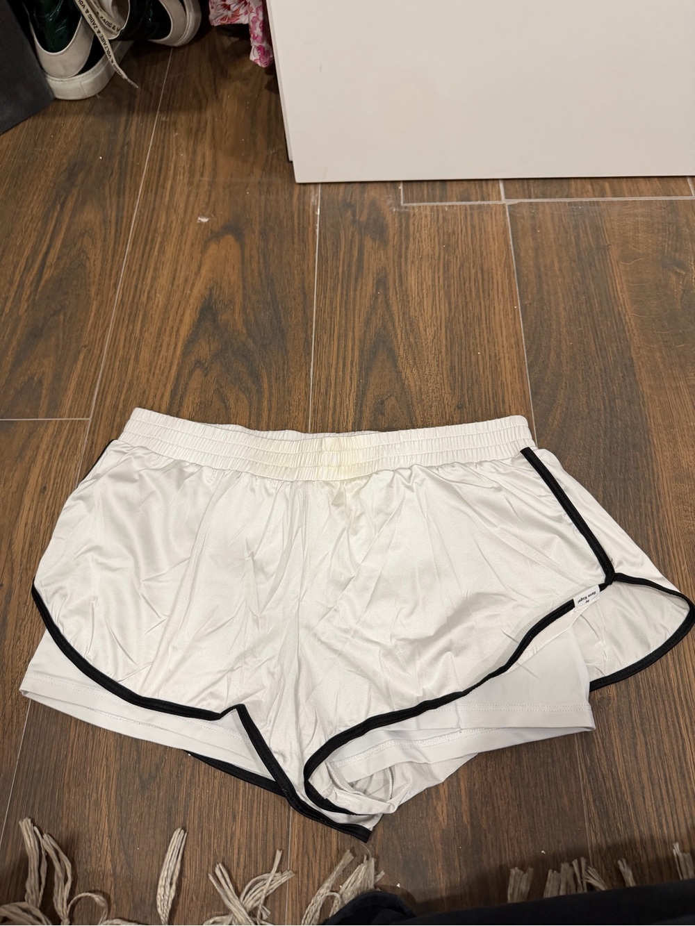 Koral White Athletic Shorts with Black Trim